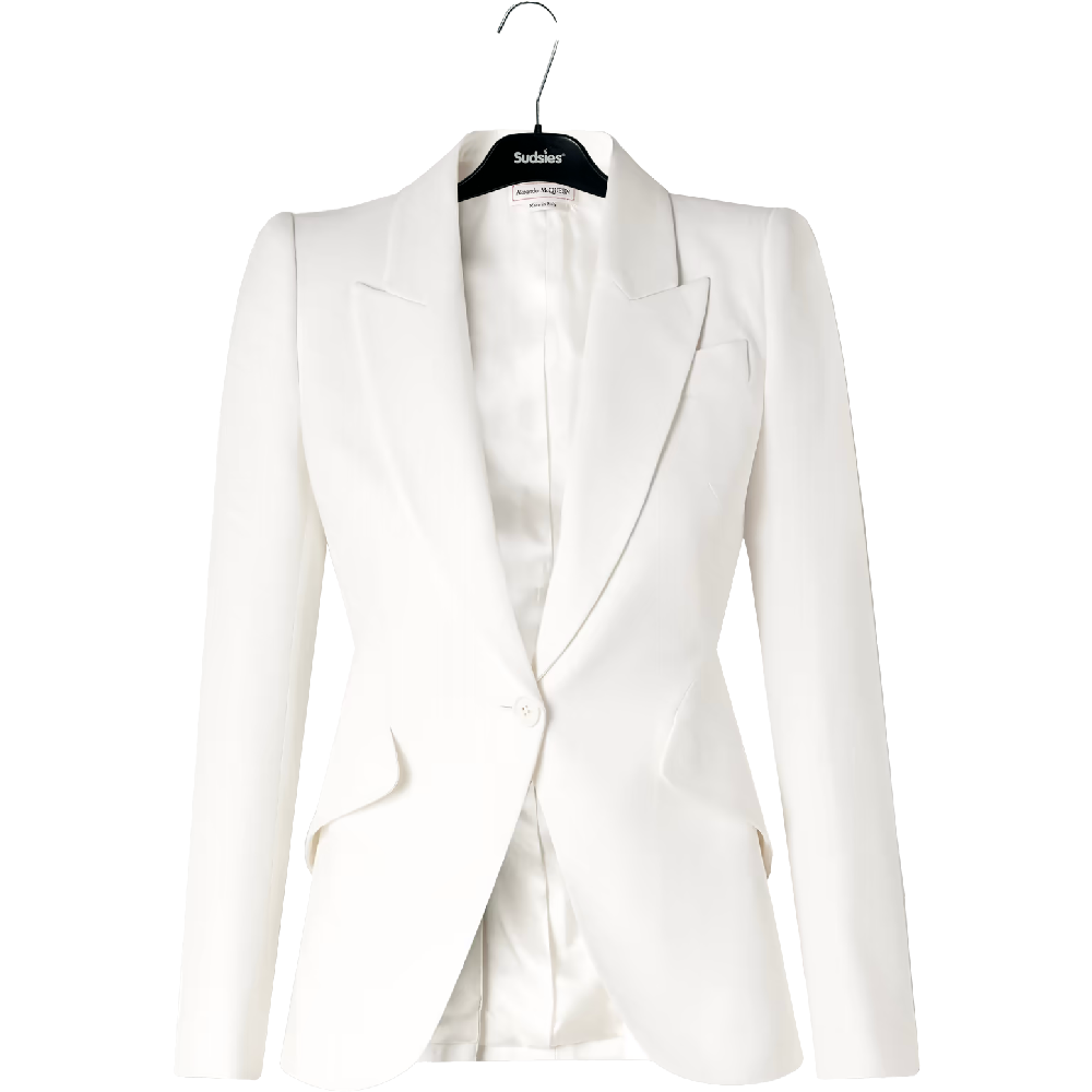 White Alexander McQueen blazer displayed on a black Sudsies hanger.