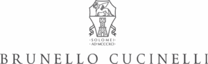 Brunello Cucinelli logo featuring a medieval-inspired crest above refined serif lettering, symbolizing artisanal Italian luxury maintained by Sudsies Dry Cleaners.