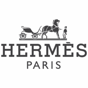 Hermès Paris logo featuring a horse-drawn carriage illustration above elegant serif text, representing timeless French luxury serviced by Sudsies Dry Cleaners.