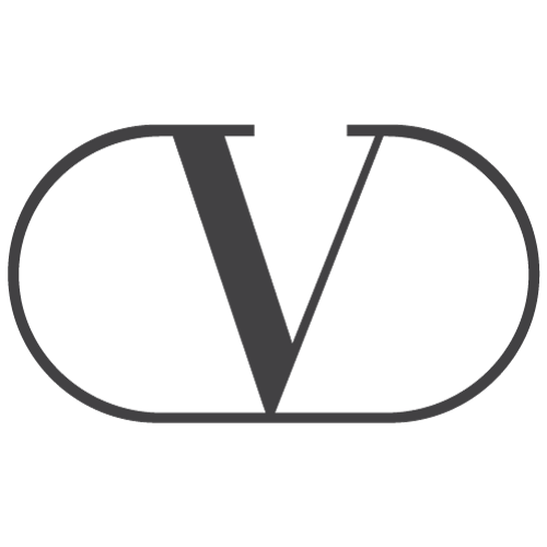 Valentino logo featuring a stylized “V” encased in an elegant oval outline, symbolizing luxury fashion garments serviced by Sudsies Dry Cleaners.